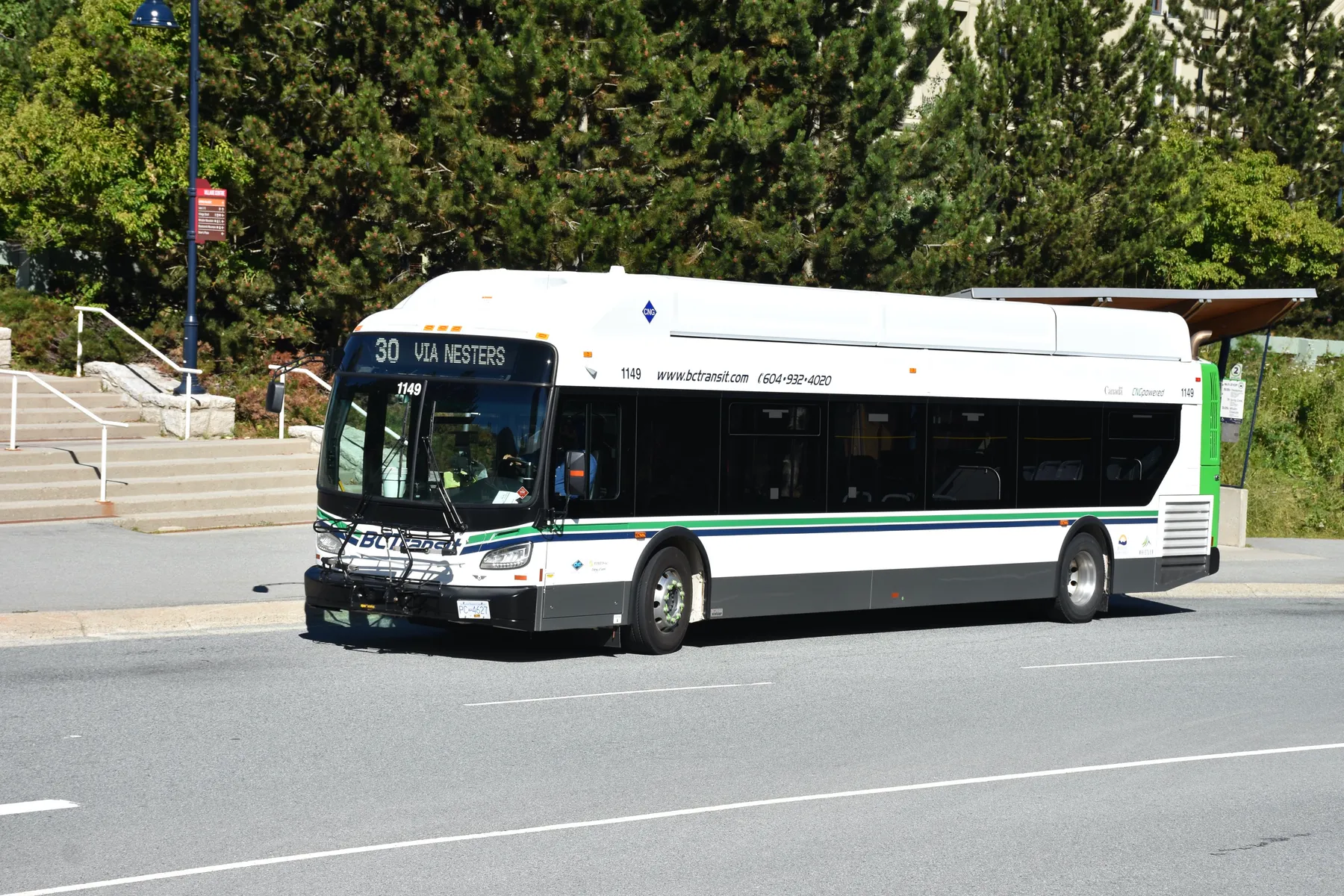 A white and green BC Transit bus on Whistler Transit route 30, via Nesters, at the Gondola Transit Exchange in Whistler Village